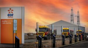 EDF car park with a line of eight Piod Point Twin Chargers, and an orange sunset in the background