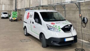 A DPD electric van plugged in to a Pod Point Solo 3 in an indoor car park