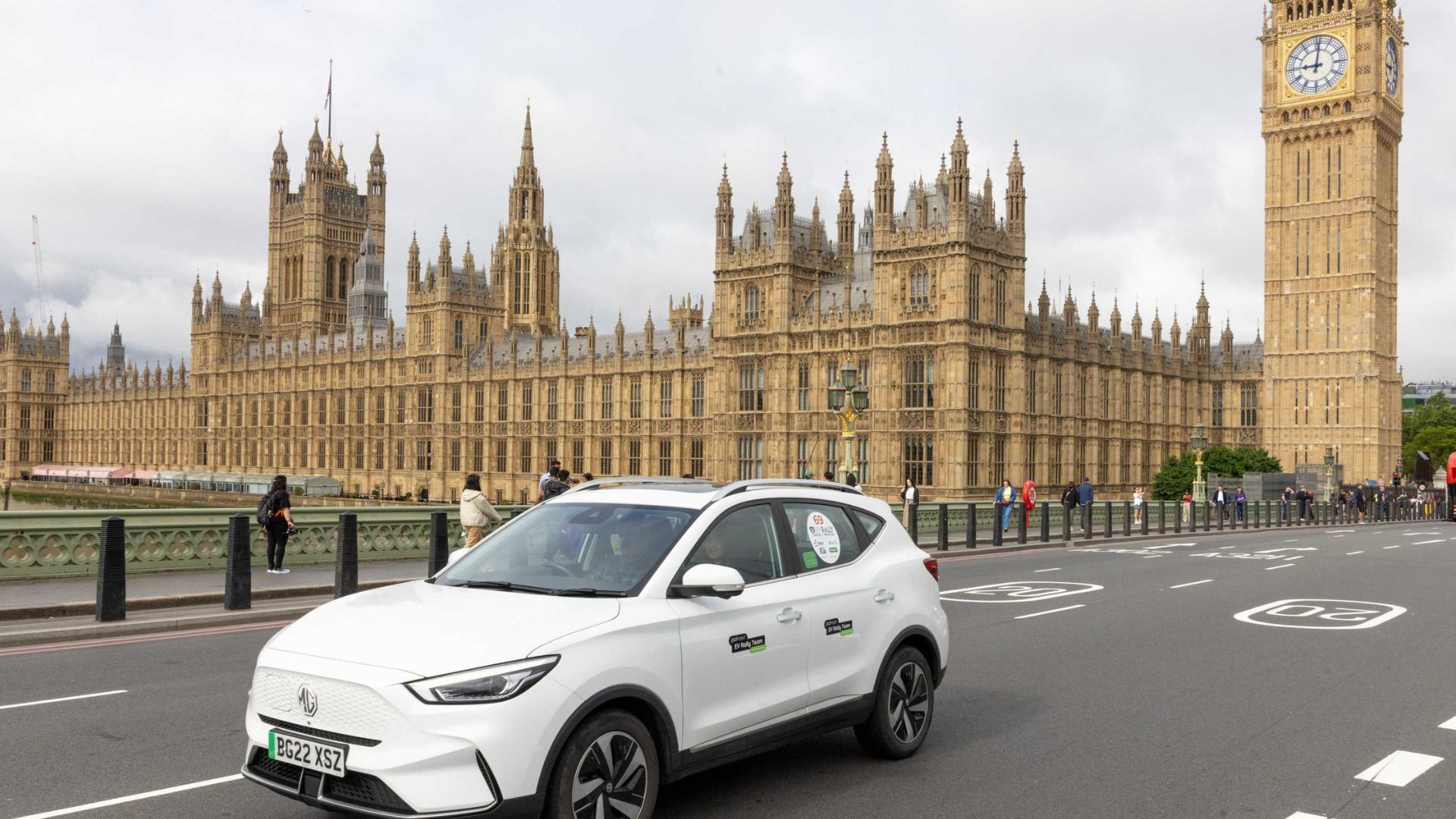 Rally car driving past the Palace of Westminster in London