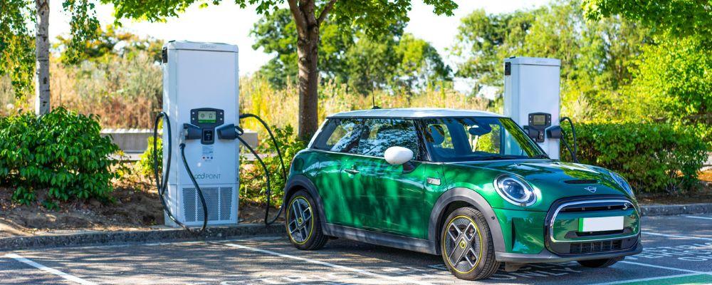 Electric car plugged into a rapid public charging station