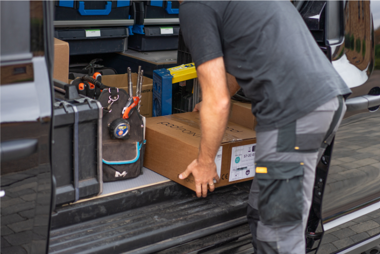 electrician unloading solo 3s from van