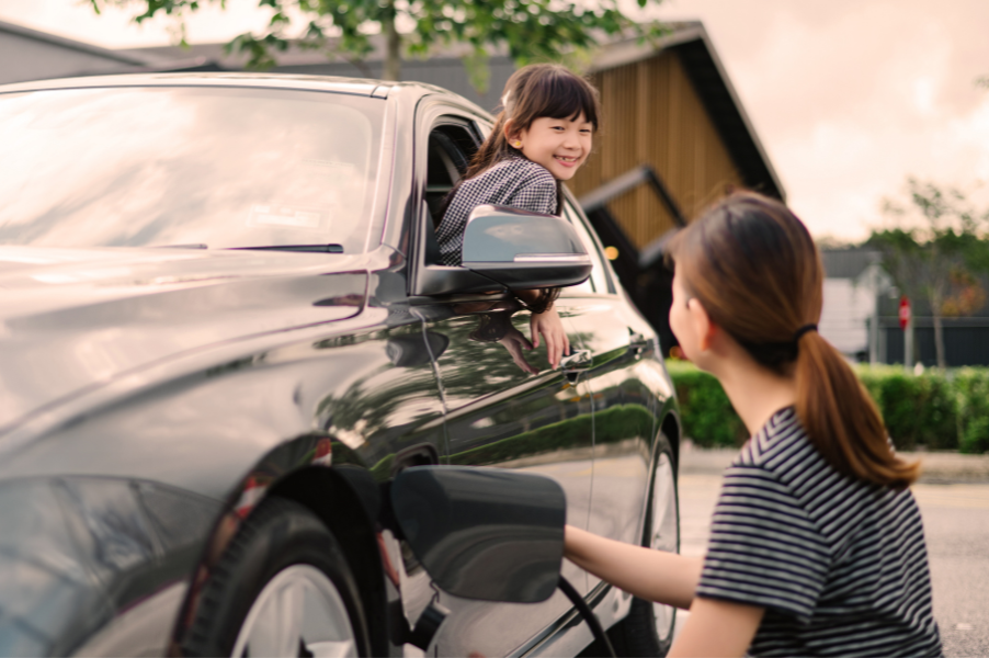 Lifestyle shot of a family in an electric vehicle